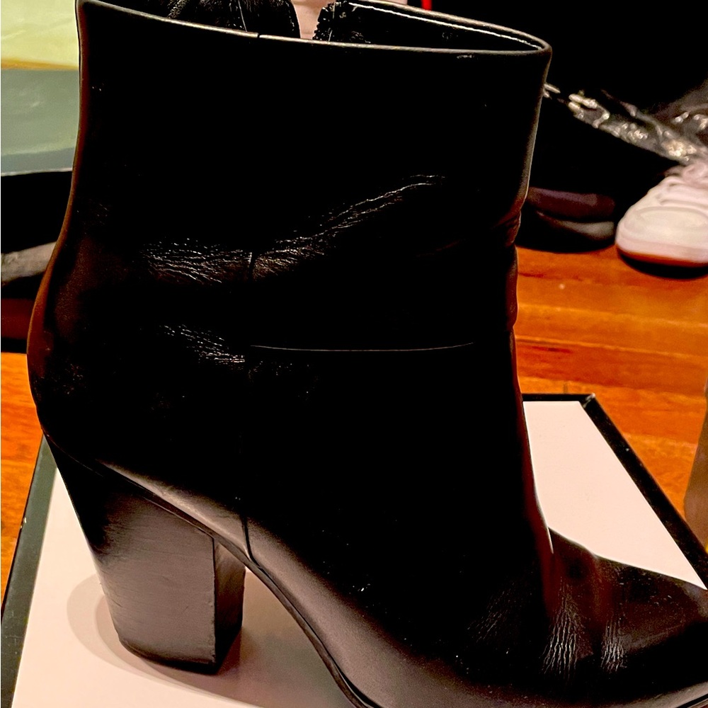 Nine West booties. Slightly worn, comfortable heel.